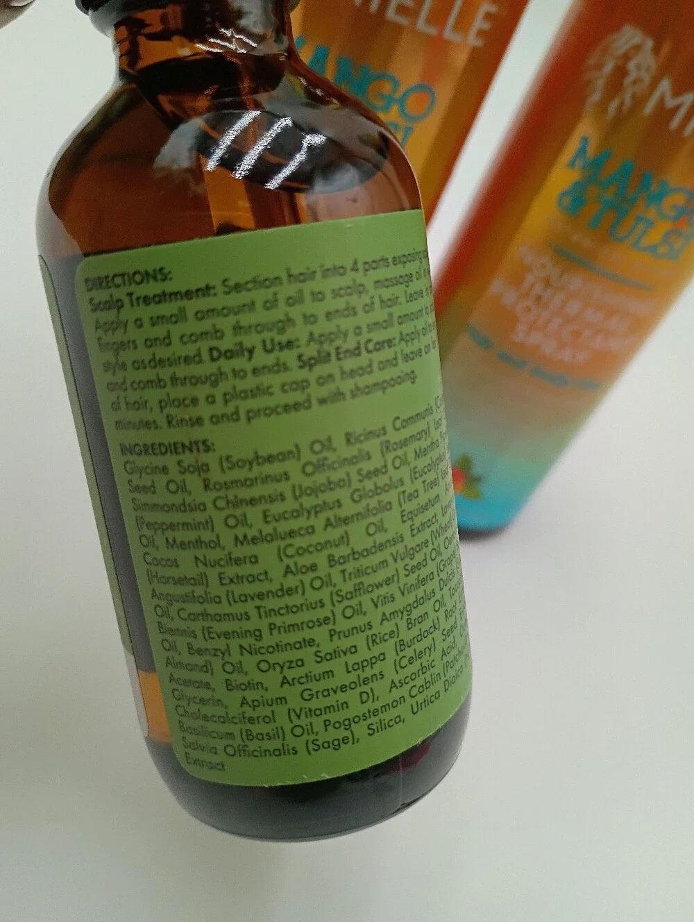 Mielle Haircare Scalp & Hair Strengthening Oil And Thermal Protectant Spray.